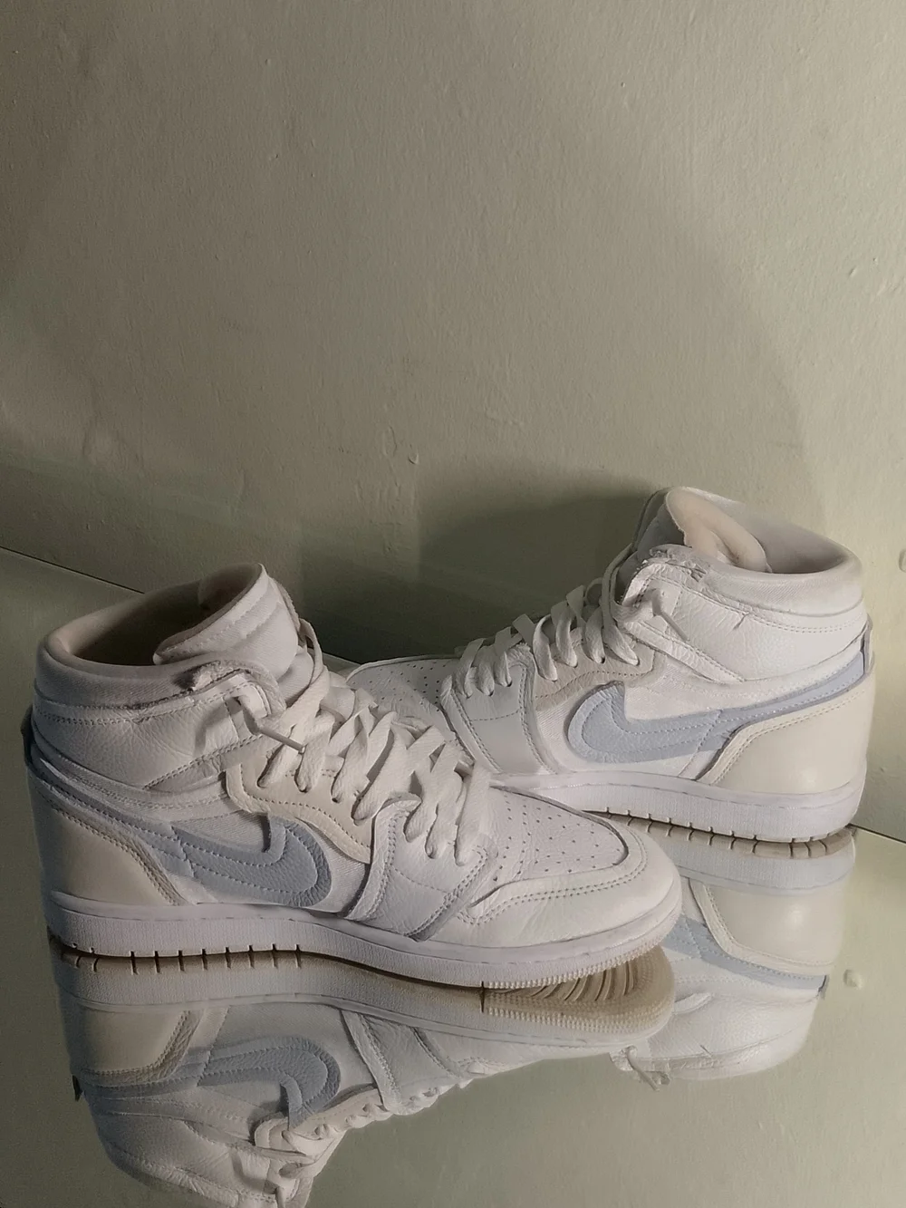 Nike Air Jordans 1 Coconut Milk. Mid-Top Sneakers in White and Light Gray